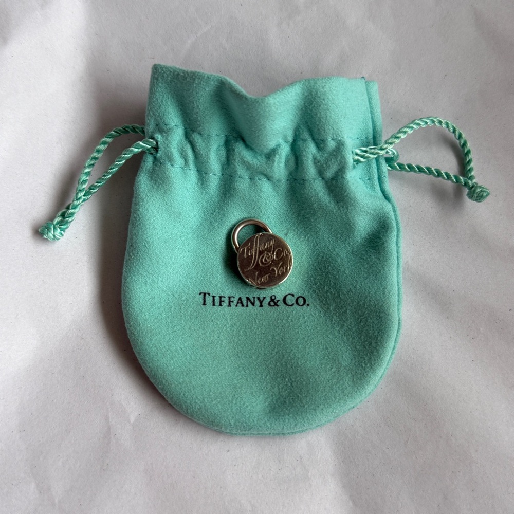 Tiffany & Co. Note Logo Padlock Round Charm